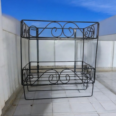 Picture of Durable Black Metal Quran and Book Stand – 2 Layers with 3 Jainamaz Hangers – Wall Mount for Home or Mosque.