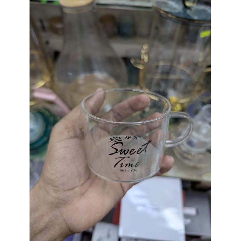Picture of Premium Sweet Time Borosilicate Glass Mug For Hot Coffee Tea Milk Capacity Heat Resistant Transparent Cup Stylish Design With Comfortable Handle Perfect For Daily Home Office Use For Beverage Lovers.