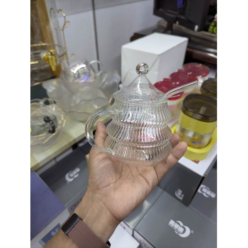 Picture of Premium 10oz Beehive Glass Juice Pot with Stirring Rod and Lid crafted from heat-resistant borosilicate glass perfect for serving fresh orange juice or fruit infusions at your modern breakfast dining table.