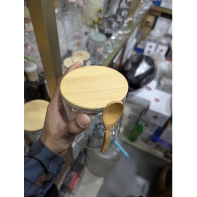 Picture of Premium Airtight Borosilicate Glass Food Storage Jar with Eco-Friendly Bamboo Lid and Matching Wooden Spoon, Perfect Transparent Spice Canister for Kitchen Organization, Coffee Beans, Loose Tea, Sugar, and Dry Food Pantry Storage.