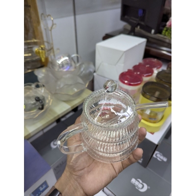 Picture of Premium 10oz Beehive Glass Juice Pot with Stirring Rod and Lid crafted from heat-resistant borosilicate glass perfect for serving fresh orange juice or fruit infusions at your modern breakfast dining table.