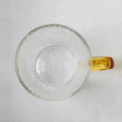 Picture of Premium Borosilicate Glass Mug with Large Yellow Handle, Funnel Shape, Dishwasher Safe - Lightweight, Classic Style, 400ml Capacity, Clear Round Glass for Tea, Coffee, and Cold Drinks.