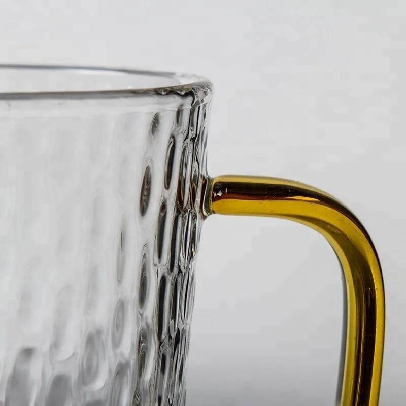Picture of Premium Borosilicate Glass Mug with Large Yellow Handle, Funnel Shape, Dishwasher Safe - Lightweight, Classic Style, 400ml Capacity, Clear Round Glass for Tea, Coffee, and Cold Drinks.