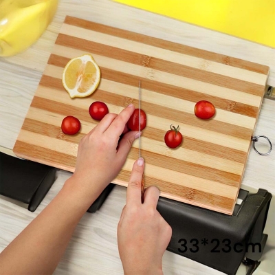 Picture of "Rectangle Bamboo Chopping Board - 33x23x1.8cm, Durable, Ideal for Meat, Veggies, and Bread, Includes Hook for Convenient Storage, Brown Wooden Board"-Brown
