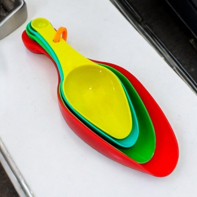 Picture of "Multi-Color Kitchen Measuring Spoon Set - 4-Piece Plastic Spoons with Small Pet Design - Accurate Baking - 1 Set"-Multicolor