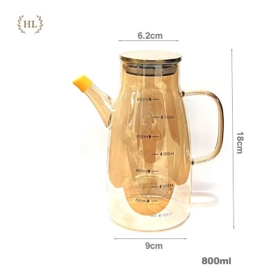Picture of 800ml 400 DEGREE HEAT RESISTANT Oil Tank | Glass jar with stopper for oil - vinegar - soy sauce - fish sauce | GOLD POTTER WITH Stainless steel lid-Gold
