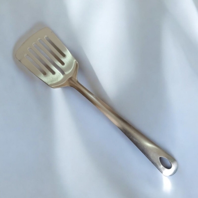 Picture of Slotted Turner Spoon, 10 Inch, Stainless Steel, Silver, Non-Magnetic. Ideal for Cooking and Serving, Combines Durability and Efficiency for Flipping and Serving Foods.-Silver