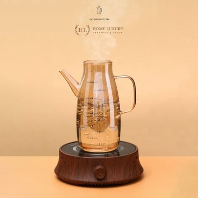 Picture of 1000ml 400 DEGREE HEAT RESISTANT Oil Tank | Glass jar with stopper for oil - vinegar - soy sauce - fish sauce | GOLD POTTER WITH Stainless steel lid-Gold
