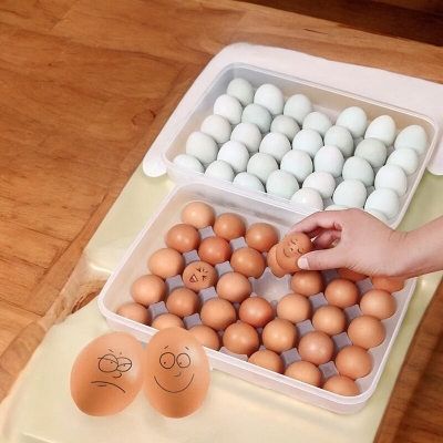 Picture of Durable 34-Grid Egg Storage Box with Lid, BPA-Free Food-Grade Plastic. Perfect Fit for Every Egg. Ideal for Refrigerator or Kitchen Use. Holds 34 Eggs. Quantity: 1 Pc.-White