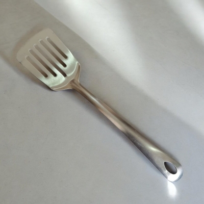 Picture of Slotted Turner Spoon, 10 Inch, Stainless Steel, Silver, Non-Magnetic. Ideal for Cooking and Serving, Combines Durability and Efficiency for Flipping and Serving Foods.-Silver