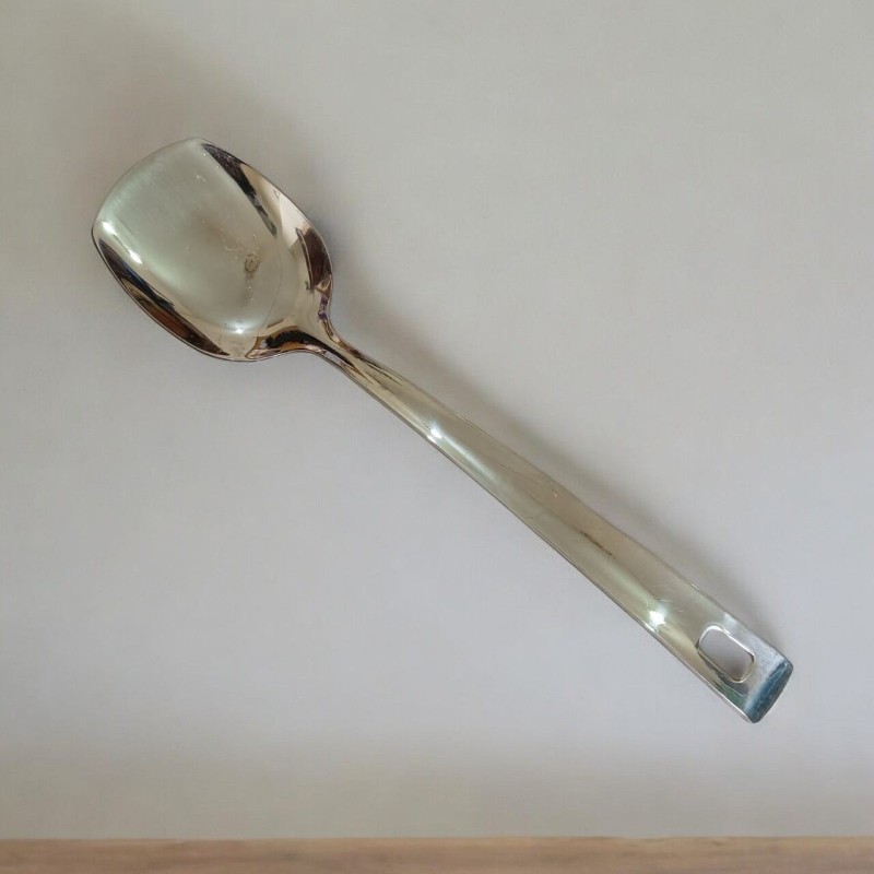 Picture of 10 Inch Stainless Steel Solid Turner Spoon, Silver Finish, Mirror Polish, Non-Magnetic. Perfect for Cooking and Serving, Combines Durability with Elegant Design for Easy Kitchen Use.-Silver