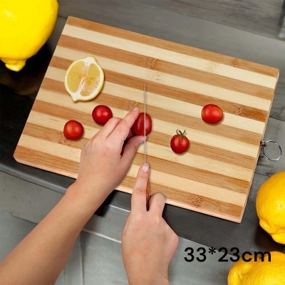 Picture of "Rectangle Bamboo Chopping Board - 33x23x1.8cm, Durable, Ideal for Meat, Veggies, and Bread, Includes Hook for Convenient Storage, Brown Wooden Board"-Brown