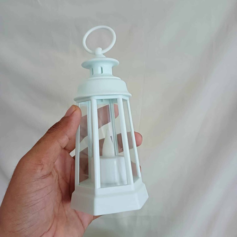 Picture of "Decorative Lantern with Flameless LED Candle Light - 17cm Multi-Color for Ramadan Kareem and Room Decor | Battery-Powered Warm Light"-Multicolor