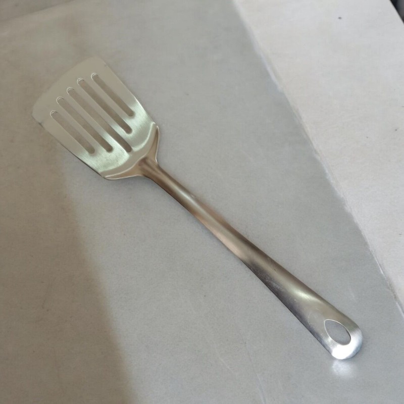 Picture of Slotted Turner Spoon, 10 Inch, Stainless Steel, Silver, Non-Magnetic. Ideal for Cooking and Serving, Combines Durability and Efficiency for Flipping and Serving Foods.-Silver