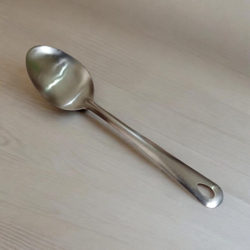Picture of 10 Inch Stainless Steel Serving Spoon, Silver, Non-Magnetic, Perfect for Cooking and Serving. Durable and Versatile, This Spoon Offers Efficiency and Style in Any Kitchen.-Silver
