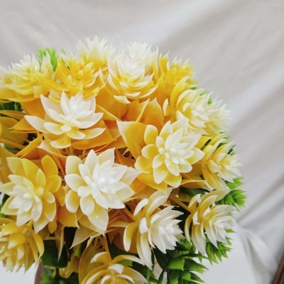 Picture of Decorate your home, hotel, or office with this 27cm Artificial Flower Plant with White Pot. Made of durable multicolor plastic, it's a perfect decorative piece. Quantity: 1 pcs.-Multicolor