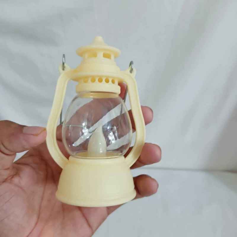 Picture of "Retro LED Oil Lamp - 12cm Multi-Color Lantern for Ramadan, Halloween, and Christmas | Battery-Powered Table and Room Light"-Multicolor