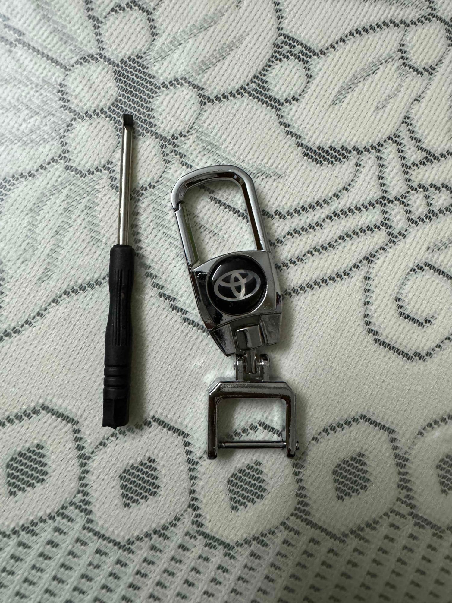 Picture of Car Keychain For Toyota - Car Accessories - cycle sticker - Silver