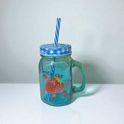 Picture of 1pcs blue glass Mason jar mug with a handle, a checkered lid, and a striped straw, designed with print print body for drinking beverages. -Blue