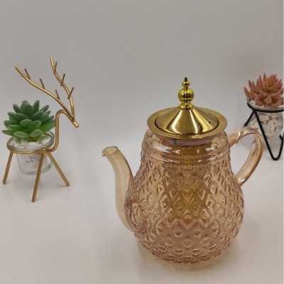 Picture of High Borosilicate Resistant tea kettlee golden colour stainless steem lid and infuser , Large Capacity, High Aesthetic Value, Household Teapot, Juice, Beverage, Light Waight 620 ml-Gold