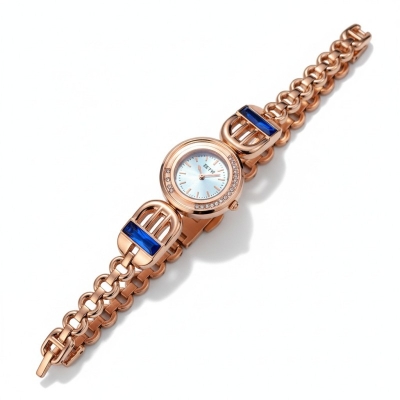 Picture of Luxury Rose Gold Women's Bracelet Watch featuring Elegant Round Dial with Crystal Bezel Blue Sapphire Baguette Gemstones Accents Premium Quartz Movement Stylish Jewelry Timepiece for Formal Occasions and Wedding Party Wear.-Multicolor
