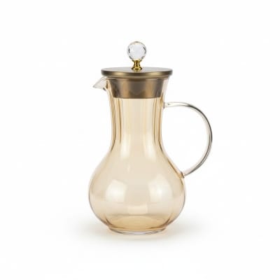 Picture of Premium Borosilicate Glass Water Pitcher with Elegant Golden Lid and Crystal Knob Top for Serving Refreshing Iced Tea Fresh Juice and Cold Beverages during Special Family Gatherings and Daily Home Dining Use.-Gold