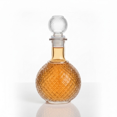 Picture of Premium Round Lead-Free Crystal Glass Whiskey Decanter with Airtight Silicone Stopper, Elegant Diamond Cut Design for Storing and Serving Bourbon, Scotch, Wine, Brandy, and Spirits in Home Bars and Special Occasions.-Multicolor