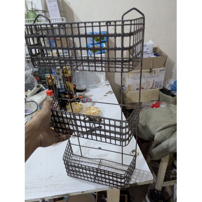 Picture of Maximize Your Living Space with this Durable 3-Tier Metal Wire Basket Storage Rack, a Multipurpose Freestanding or Wall-Mounted Organizer Ideal for Efficiently Storing Bathroom Toiletries, Kitchen Spices, and Essential Household Items.-Black