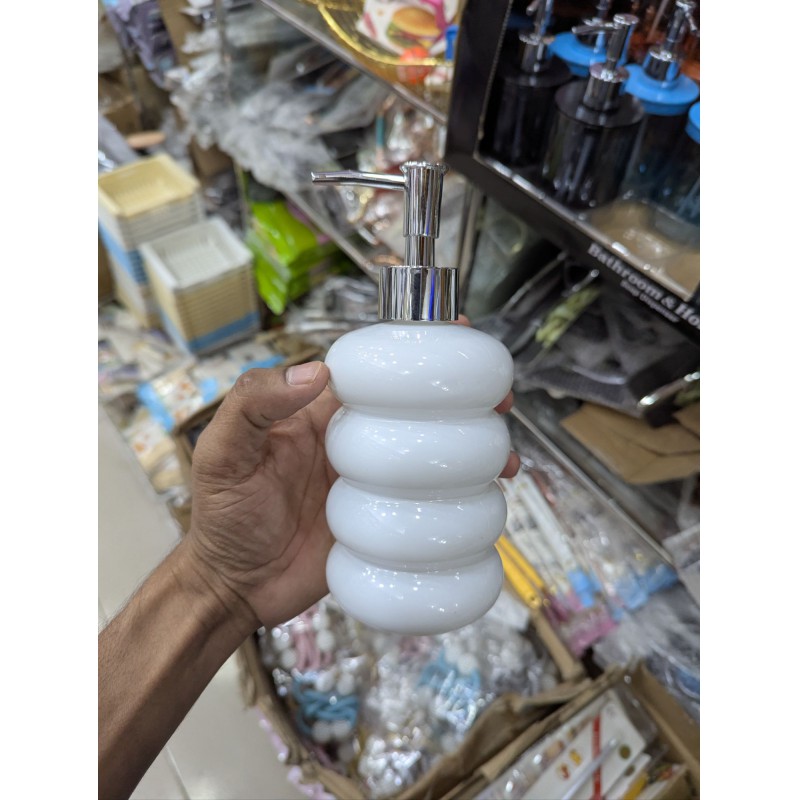 Picture of Elegant Modern White Ceramic Soap Dispenser with Chrome Pump: A Stylish Multi-Layer Stacked Bubble Design Liquid Hand Soap, Lotion, and Shampoo Bottle Perfect for Contemporary Bathroom Vanity or Kitchen Sink Decor Aesthetics.-White