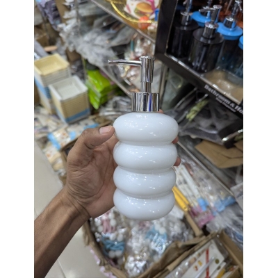 Picture of Elegant Modern White Ceramic Soap Dispenser with Chrome Pump: A Stylish Multi-Layer Stacked Bubble Design Liquid Hand Soap, Lotion, and Shampoo Bottle Perfect for Contemporary Bathroom Vanity or Kitchen Sink Decor Aesthetics.-White