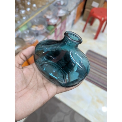Picture of Elegant Handcrafted Teal Blue Recycled Glass Vase with Organic Bulbous Shape and Lipped Opening, Perfect Eco-Friendly Mediterranean Style Decorative Flower Bottle for Modern Sustainable Home Decor Accents and Unique Artisanal Gifting.-Multicolor