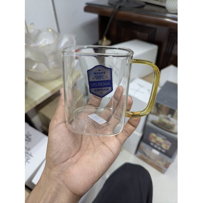 Picture of Premium Heat-Resistant Square Borosilicate Glass Mug with Ergonomic Amber Handle for Hot Tea, Coffee, and Espresso – Durable, Microwave and Dishwasher Safe Minimalist Transparent Glassware for Modern Home and Office Beverage Serving.-Multicolor
