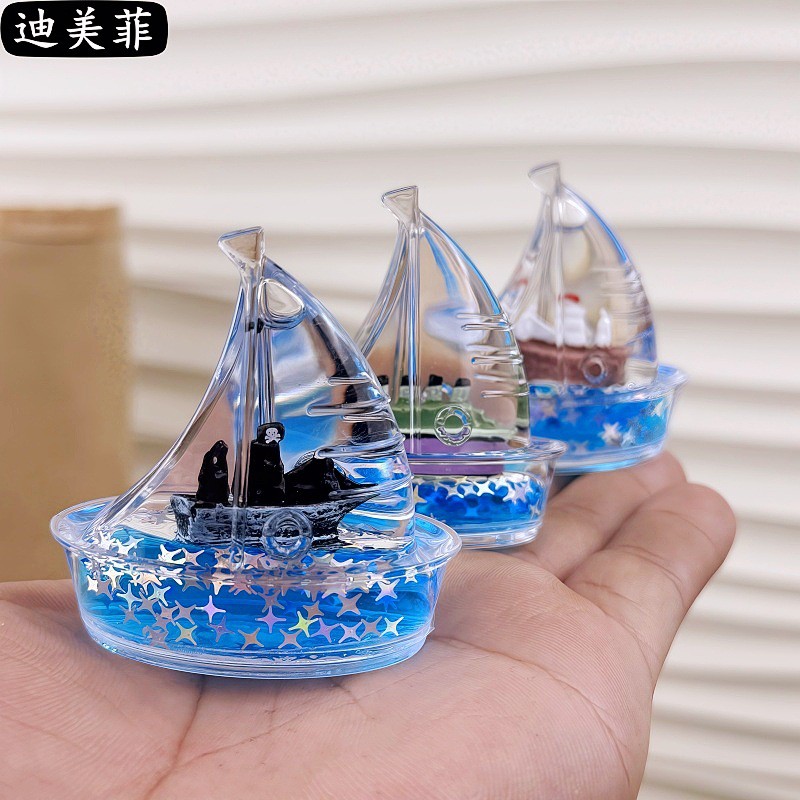 Picture of 1 pcs Acrylic Sailboat Figurine with Star Glitter & Mineral Oil Novel Ocean-Themed Home Decor for Gifts-Multicolor