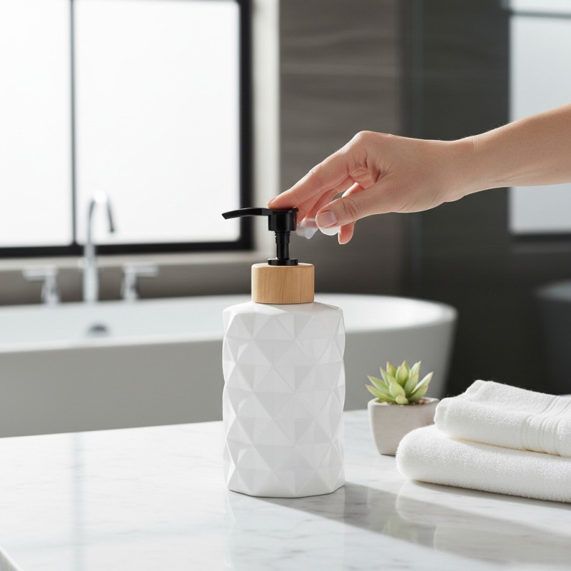 Picture of Premium white ceramic refillable soap dispenser for bathroom or kitchen sink use featuring a durable pump mechanism perfect for holding liquid hand soap and lotions in your modern home decor setup today.-white