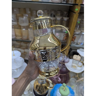 Picture of Premium Arabian Style Gold Decal Glass Pitcher with Lid for Serving Cold Water, Iced Tea, and Juice, Featuring Heat-Resistant Borosilicate Glass and Elegant Greek Key Patterns for Luxury Home Dining.-Gold