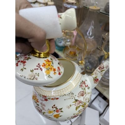 Picture of Premium Quality Favourite Floral Enamel Tea Kettle with Heat Resistant Ceramic Handle Durable Carbon Steel Construction Elegant Rose Design Porcelain Coating Suitable for Induction Gas Electric Stovetop Boiling Water Teapot Home.-Multicolor