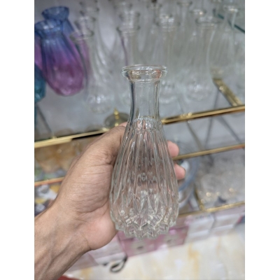 Picture of Elegant Clear Glass Bud Vase Vintage Style Small Flower Bottle with Embossed Diamond Pattern for Wedding Centerpieces Tabletop Home Decor Modern Minimalist Hydroponic Floral Arrangement Single Stem Decorative Glassware 3.5 Inch Tall-Multicolor