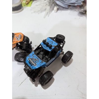 Picture of Durable  Pull Back Monster Truck with High Elastic Metal Shock Absorbers Manual Spring System Off-Road Climbing Car Toy for Toddlers Kids Boys Girls Ages 3 to 10 Years Old.-Multicolor