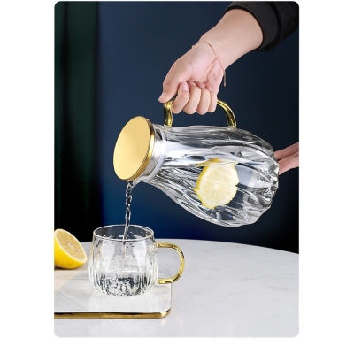 Picture of Premium Glass Water Pitcher with Stainless Steel Lid and Spout, Heat Resistant 2-Litre Modern Kettle Carafe for Hot and Cold Beverages, Dishwasher Safe Round BPA-Free Design with Anti-Corrosion Material and Strong Handle-multicolor
