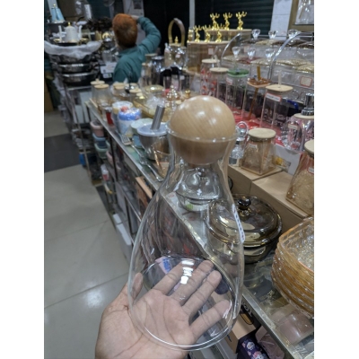 Picture of Borosilicate Glass Decanter Carafe with Natural Wooden Ball Stopper, Transparent Pitcher for Serving Water, Wine, Juice, or Whiskey, Modern Stylish Tabletop Beverage Server for Home Dining and Luxury Bar Decor.-Multicolor