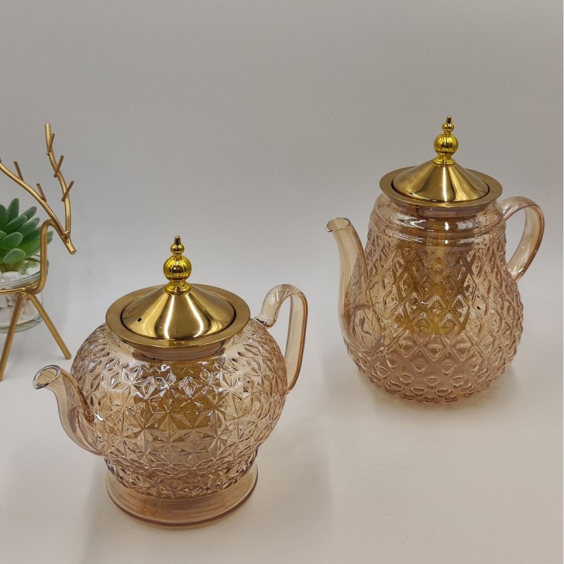 Picture of High Borosilicate Resistant tea kettlee golden colour stainless steem lid and infuser , Large Capacity, High Aesthetic Value, Household Teapot, Juice, Beverage, Light Waight 620 ml-Gold