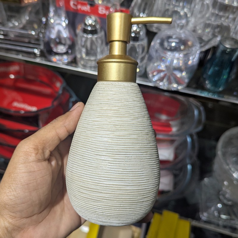 Picture of Elegant white ribbed ceramic soap dispenser featuring a premium gold-toned pump mechanism perfect for enhancing your bathroom vanity decor or modern kitchen sink countertop with a sophisticated and timeless touch of style.-Multicolor