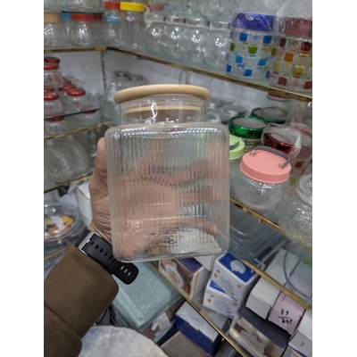 Picture of Airtight Glass Cookie Jar with Bamboo Lid for Kitchen Storage 1000ml Capacity Ribbed Textured Clear Glass Container Perfect for Storing Biscuits Sweets Dry Fruits Tea Leaves and Snacks Efficiently Online.-Multicolor