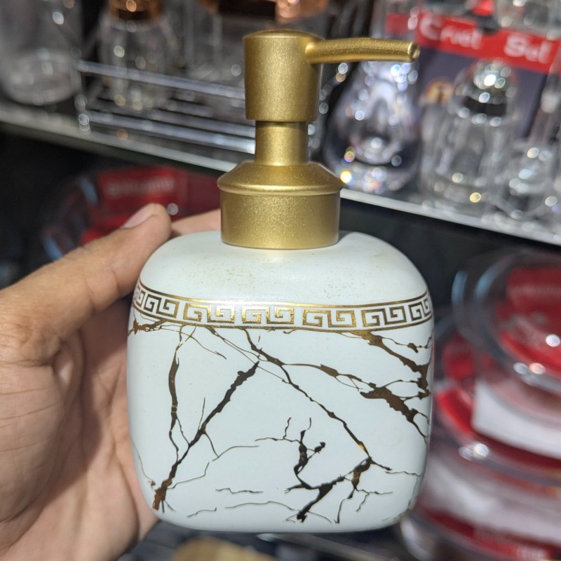 Picture of Luxury white marble ceramic soap dispenser featuring a stunning gold Greek key pattern around the neck and a premium gold pump perfect for enhancing your sophisticated bathroom vanity or modern kitchen decor.-white