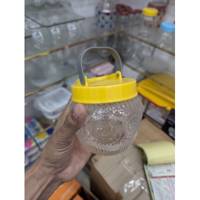 Picture of Premium Patterned Glass Kitchen Storage Jar with Airtight Yellow Lid and Metal Carrying Handle, Large Capacity Transparent Food Container for Fresh Cereal, Cookies, Snacks, and Pantry Organization for Modern Home Decor.-Multicolor