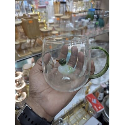 Picture of Premium quality Whale Oceano glass mug featuring a handcrafted 3D blue whale figurine inside, made from durable heat resistant borosilicate glass perfect for enjoying hot coffee, tea, or cold beverages daily.-Multicolor
