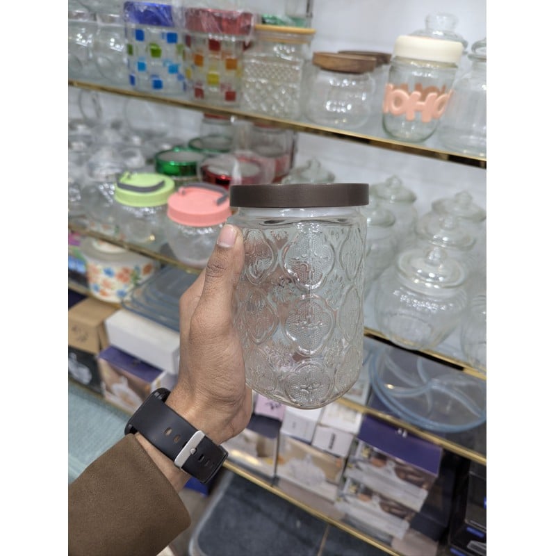 Picture of Premium Airtight Glass Cookie Jar with Decorative Brown Metal Lid for Kitchen Countertop Storage of Fresh Homemade Chocolate Chip Biscuits, Snacks, and Pantry Essentials with Retro Embossed Floral Pattern Style Design.-Multicolor
