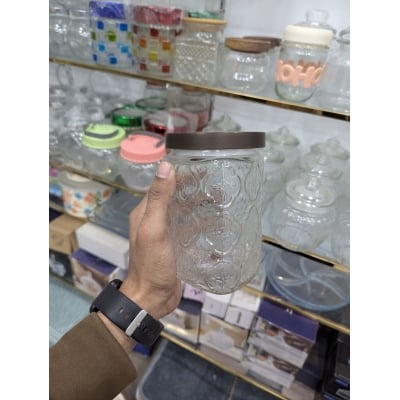 Picture of Premium Airtight Glass Cookie Jar with Decorative Brown Metal Lid for Kitchen Countertop Storage of Fresh Homemade Chocolate Chip Biscuits, Snacks, and Pantry Essentials with Retro Embossed Floral Pattern Style Design.-Multicolor