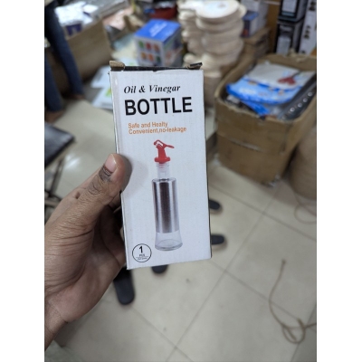 Picture of Premium 300ml Leak-Proof Glass Oil Control Pot and Vinegar Dispenser with Protective Stainless Steel Shell, Food-Grade Dust-Proof Pouring Spout, and Ergonomic Non-Drip Design for Precision Cooking, Healthy Meal Prep, and Kitchen Organization.-Multicolor