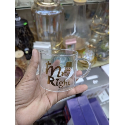 Picture of Elegant Mr. Right Transparent Glass Mug for Coffee and Tea Lovers Featuring Stylish Gold Typography with Mustache and Hat Graphics Perfect Gift for Anniversaries Weddings Birthdays and Special Couple Celebrations.-Multicolor